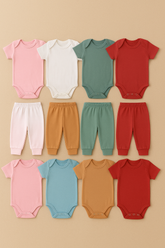 Kit 12 Peças Bebê – 8 Bodys Manga Curta e 4 Mijões, Cores Sortidas e Conforto Diário